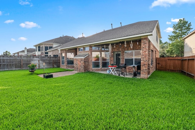 3318 Legends Mist Dr, Spring, TX 77386 - rear view of property with a patio, a fenced backyard, and brick siding