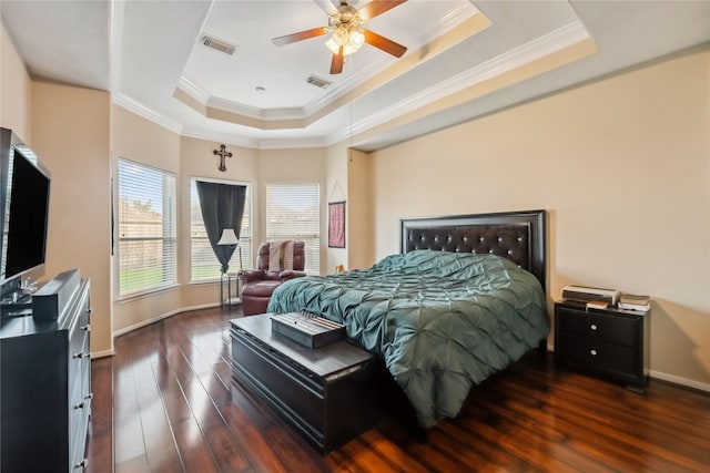 3318 Legends Mist Dr, Spring, TX 77386 - bedroom with a tray ceiling, crown molding, dark wood finished floors, and ceiling fan