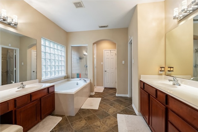 3318 Legends Mist Dr, Spring, TX 77386 - full bathroom with a bath, a shower stall, and two vanities