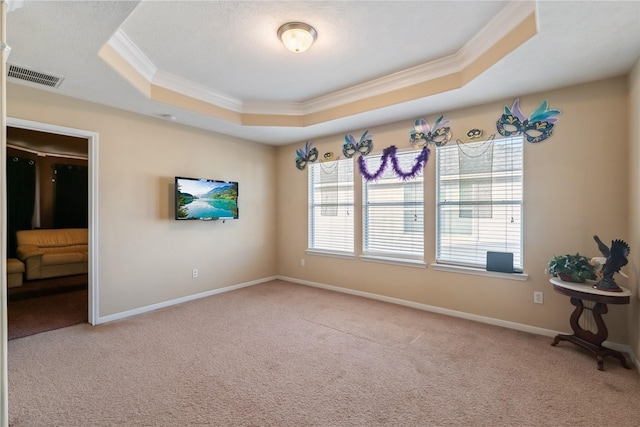 3318 Legends Mist Dr, Spring, TX 77386 - empty room with a tray ceiling, ornamental molding, and carpet floors
