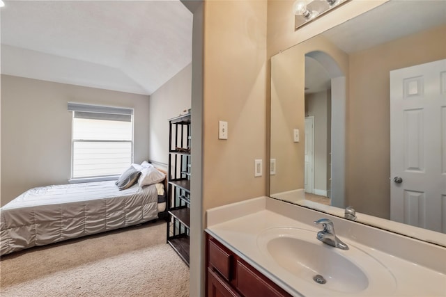 3318 Legends Mist Dr, Spring, TX 77386 - ensuite bathroom with vanity and vaulted ceiling