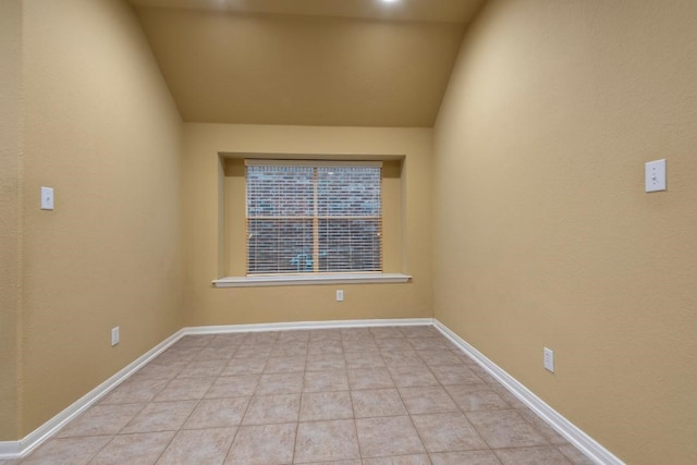 10406 Friars Hill Ln, Houston, TX 77070 - unfurnished room featuring vaulted ceiling and light tile patterned flooring