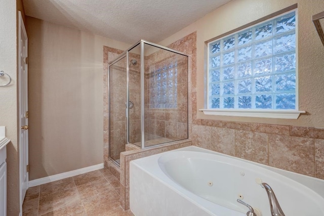 10406 Friars Hill Ln, Houston, TX 77070 - full bathroom featuring a shower stall, a whirlpool tub, and a textured ceiling