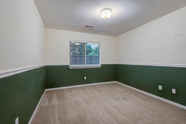 10406 Friars Hill Ln, Houston, TX 77070 - carpeted empty room with a textured ceiling and baseboards