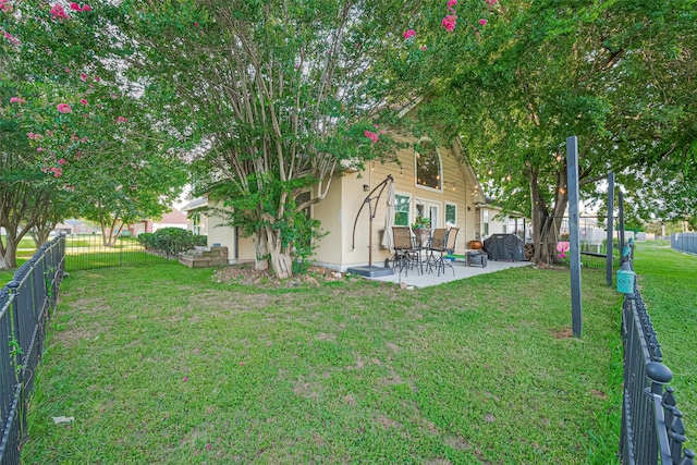 152 Snug Harbor Dr, Conroe, TX 77356 - fenced backyard with a patio