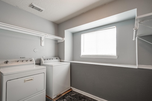 16311 Sylvan Dale Dr, Humble, TX 77346 - washroom with washer and dryer and baseboards