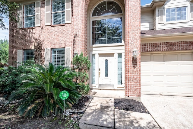 16311 Sylvan Dale Dr, Humble, TX 77346 - entrance to property with brick siding and a garage