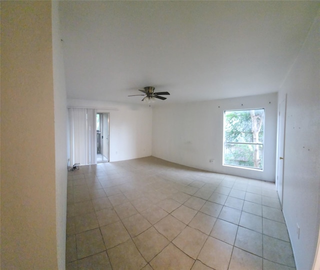 5665 Birchmont Dr Unit G, Houston, TX 77091 - spare room featuring light tile patterned flooring and ceiling fan
