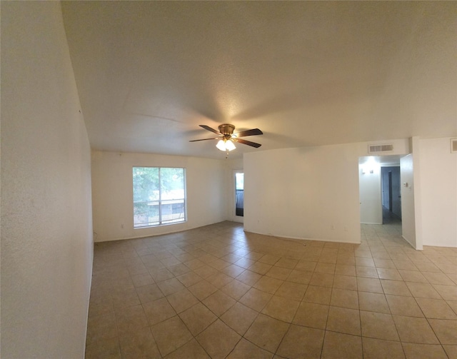 5665 Birchmont Dr Unit G, Houston, TX 77091 - spare room with light tile patterned floors and a ceiling fan