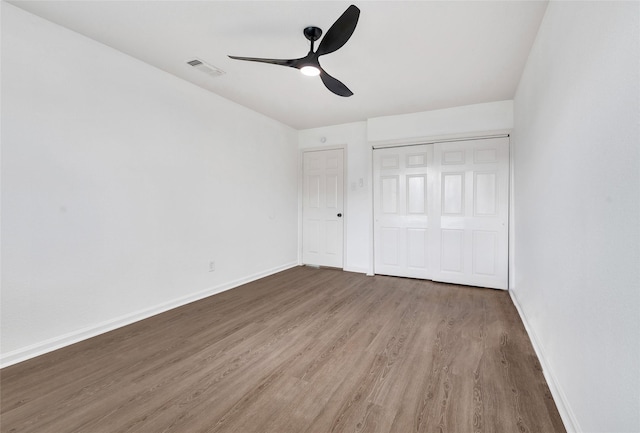 14923 Bathurst Dr, Houston, TX 77053 - unfurnished bedroom with wood finished floors, a closet, and ceiling fan