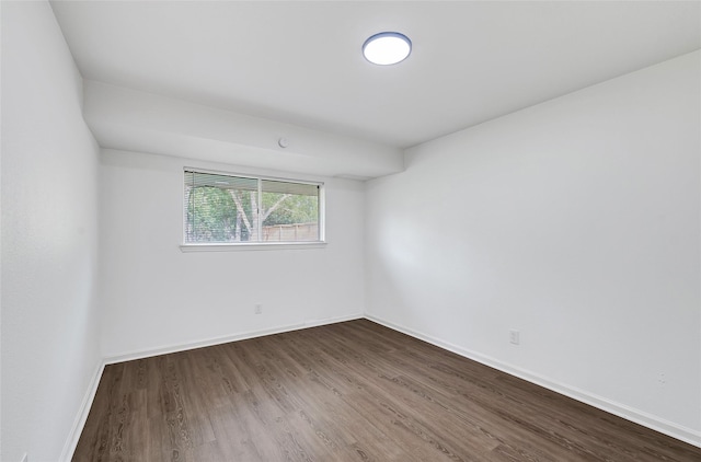 14923 Bathurst Dr, Houston, TX 77053 - spare room with dark wood-style flooring and baseboards