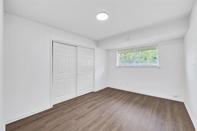 14923 Bathurst Dr, Houston, TX 77053 - unfurnished bedroom featuring wood finished floors and a closet