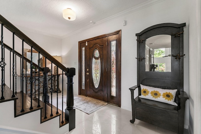 7310 Blenheim Palace Ln, Houston, TX 77095 - tiled foyer entrance featuring arched walkways, ornamental molding, stairway, and a textured ceiling