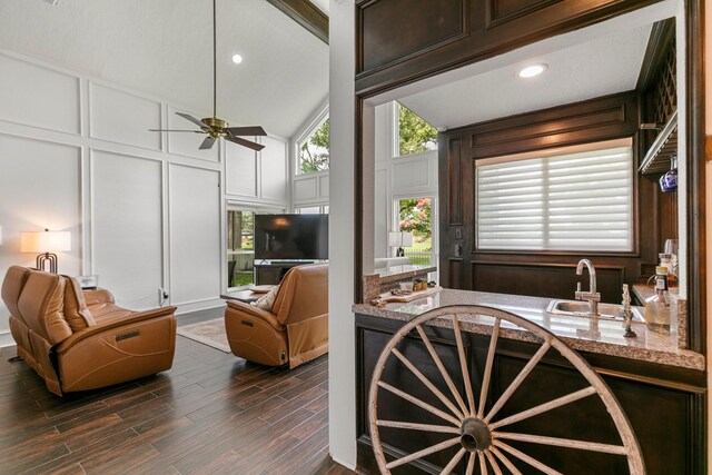 7310 Blenheim Palace Ln, Houston, TX 77095 - living room featuring a decorative wall, dark wood finished floors, a ceiling fan, high vaulted ceiling, and recessed lighting