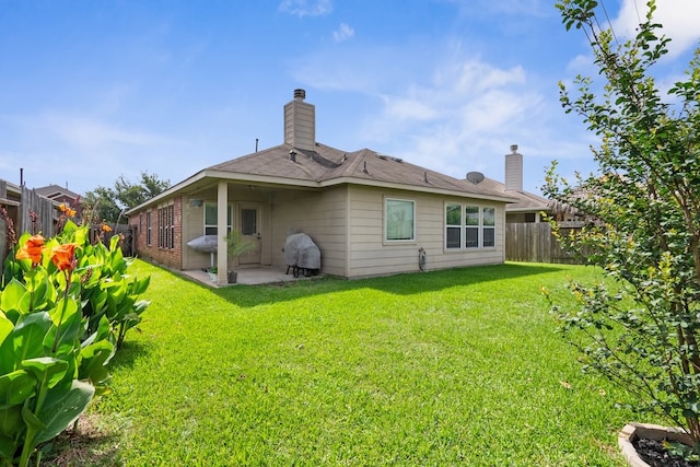 20930 Morgan Knoll Ln, Katy, TX 77449 - rear view of property featuring a patio area, a fenced backyard, and a chimney