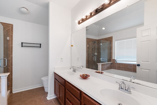 20930 Morgan Knoll Ln, Katy, TX 77449 - full bathroom with a stall shower, double vanity, a garden tub, and tile patterned flooring