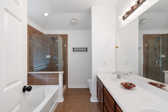 20930 Morgan Knoll Ln, Katy, TX 77449 - full bath with double vanity, a shower stall, a bath, tile patterned flooring, and recessed lighting