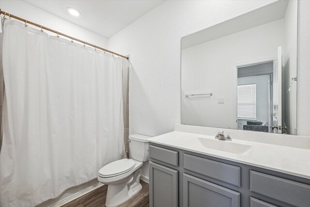 7227 Songlark Landing Ct, Katy, TX 77493 - full bathroom with wood finished floors, vanity, and recessed lighting