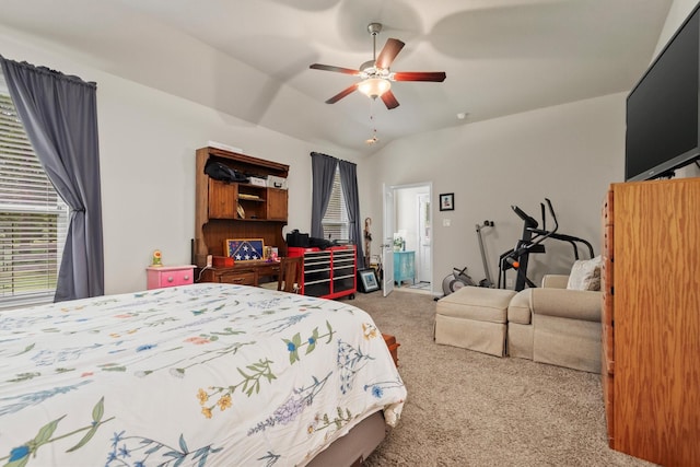 9171 White Tail Dr, Conroe, TX 77303 - carpeted bedroom with vaulted ceiling and ceiling fan