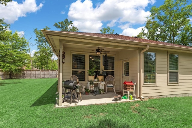 9171 White Tail Dr, Conroe, TX 77303 - rear view of property featuring a patio area and a ceiling fan