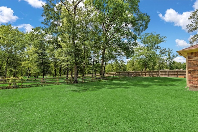 9171 White Tail Dr, Conroe, TX 77303 - fenced backyard with view of scattered trees