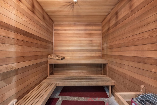 1211 Caroline St Unit 1504, Houston, TX 77002 - sauna with wood walls and wooden ceiling