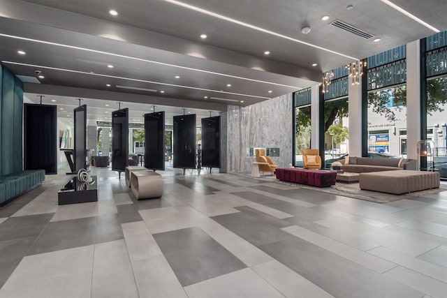 1211 Caroline St Unit 1504, Houston, TX 77002 - community lobby with expansive windows and recessed lighting