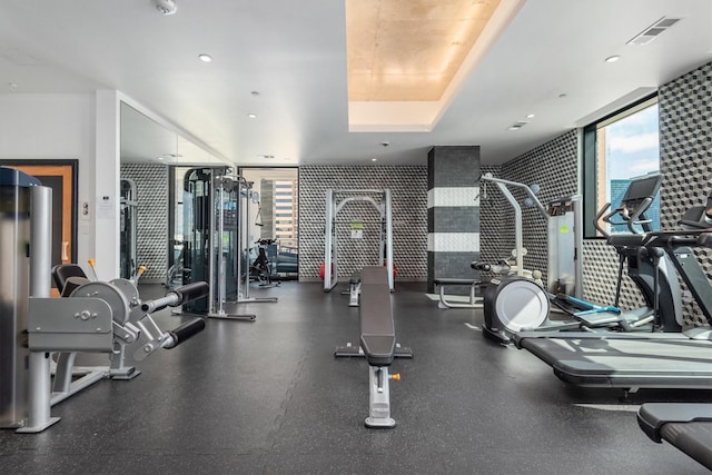 1211 Caroline St Unit 1504, Houston, TX 77002 - exercise room with healthy amount of natural light and floor to ceiling windows