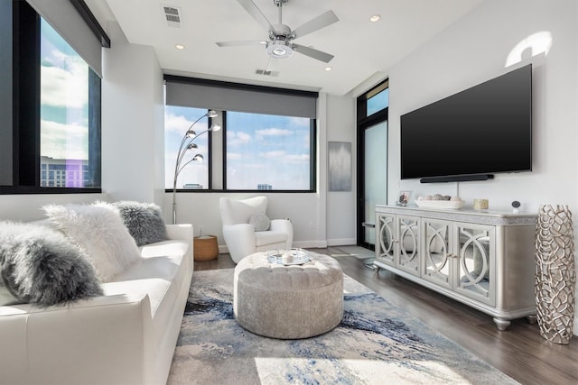 1211 Caroline St Unit 1504, Houston, TX 77002 - living room with wood finished floors, ceiling fan, and recessed lighting