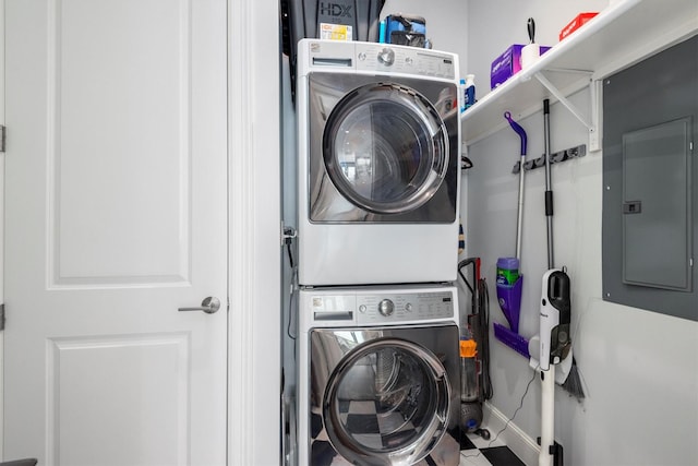 1211 Caroline St Unit 1504, Houston, TX 77002 - laundry room with stacked washer / dryer and electric panel