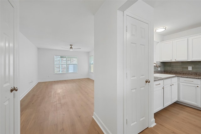 206 Delaney St, Houston, TX 77009 - corridor with a sink and light wood-type flooring