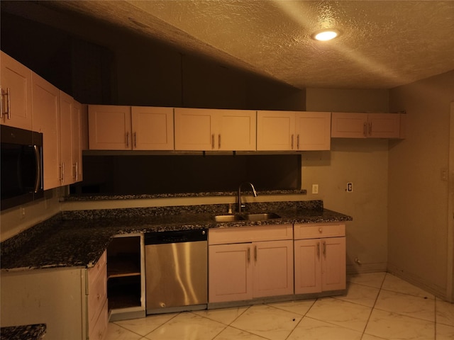 6410 Barrygate Dr, Spring, TX 77373 - kitchen with dishwasher, black microwave, a textured ceiling, light marble finish floors, and dark stone counters