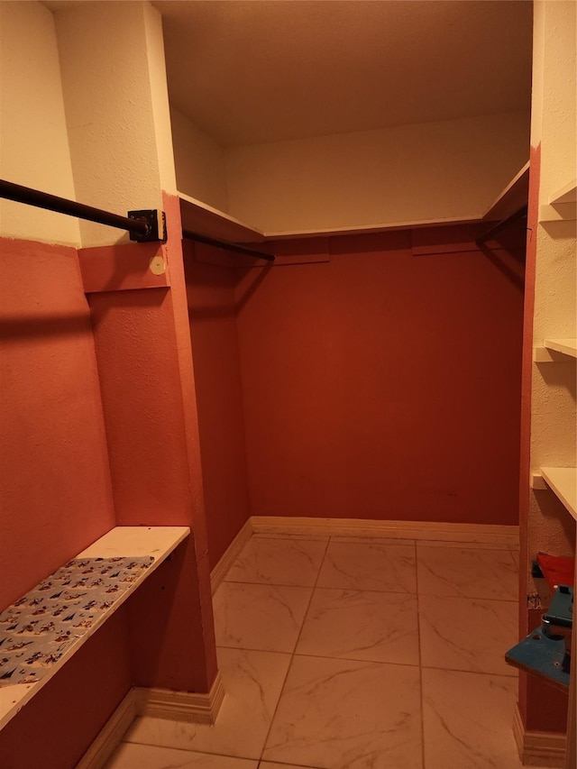 6410 Barrygate Dr, Spring, TX 77373 - walk in closet with marble finish floors