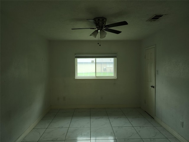 6410 Barrygate Dr, Spring, TX 77373 - spare room with light marble finish flooring and ceiling fan