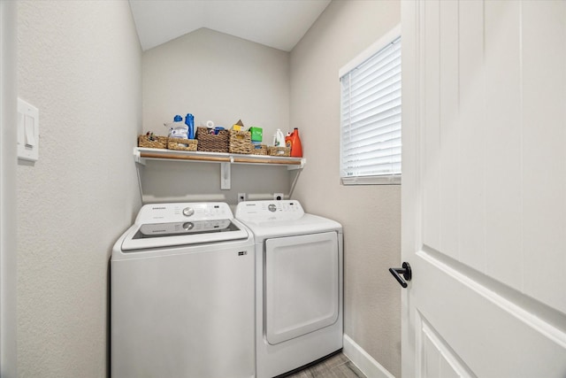 6730 Knox St Unit A, Houston, TX 77091 - laundry area featuring washing machine and dryer and wood finished floors