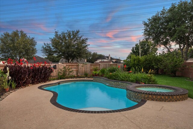 2332 Shadow Falls Ln, Pearland, TX 77584 - view of pool featuring a fenced backyard, a pool with connected hot tub, and a patio