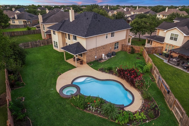 2332 Shadow Falls Ln, Pearland, TX 77584 - view of pool with a patio, a gazebo, a fenced backyard, a residential view, and a pool with connected hot tub