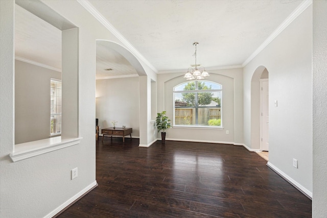 2332 Shadow Falls Ln, Pearland, TX 77584 - unfurnished dining area featuring arched walkways, ornamental molding, wood-type flooring, and a chandelier