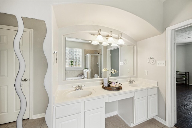 2332 Shadow Falls Ln, Pearland, TX 77584 - bathroom featuring a stall shower, double vanity, and tile patterned floors