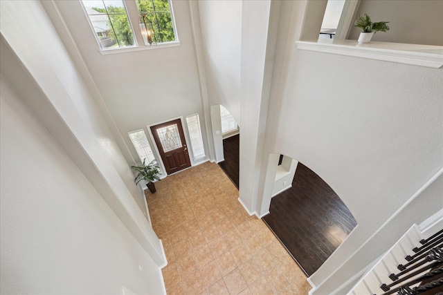 2332 Shadow Falls Ln, Pearland, TX 77584 - tiled foyer entrance with a high ceiling and arched walkways