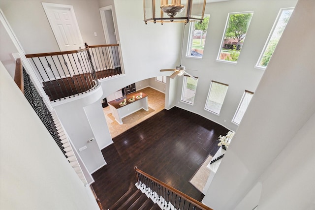 2332 Shadow Falls Ln, Pearland, TX 77584 - foyer entrance featuring a high ceiling, wood finished floors, and a ceiling fan