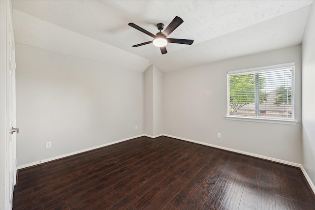 2332 Shadow Falls Ln, Pearland, TX 77584 - unfurnished room with dark wood-type flooring, a ceiling fan, and lofted ceiling