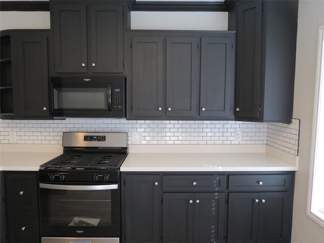 11918 Sagedowne Ln, Houston, TX 77089 - kitchen featuring black microwave, gas stove, decorative backsplash, open shelves, and light countertops
