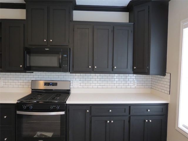 11918 Sagedowne Ln, Houston, TX 77089 - kitchen with black microwave, gas range, decorative backsplash, and light countertops