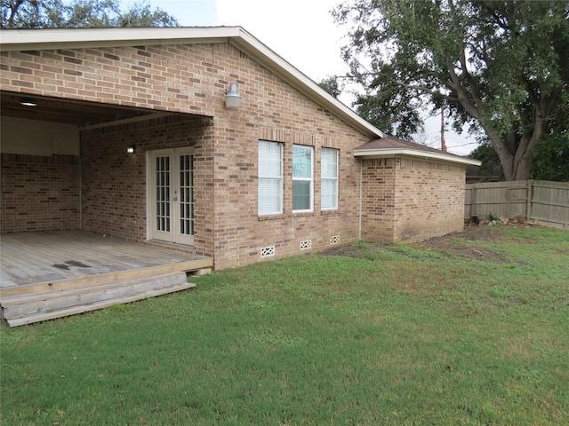 11918 Sagedowne Ln, Houston, TX 77089 - rear view of house with french doors, brick siding, a wooden deck, and crawl space