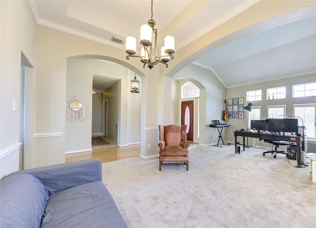 23742 Indian Hills Way, Katy, TX 77494 - carpeted living area with arched walkways, an office area, a chandelier, and ornamental molding