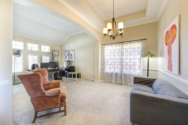 23742 Indian Hills Way, Katy, TX 77494 - living area featuring arched walkways, a chandelier, carpet flooring, crown molding, and an office area