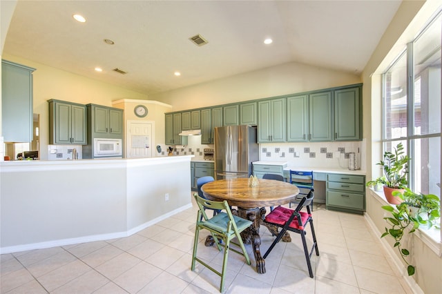 23742 Indian Hills Way, Katy, TX 77494 - dining room with vaulted ceiling, recessed lighting, and light tile patterned flooring