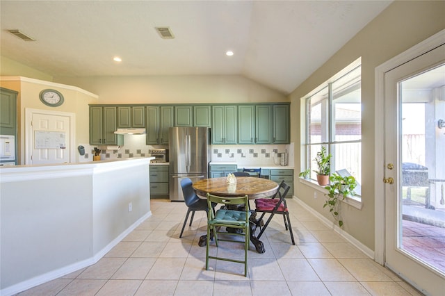 23742 Indian Hills Way, Katy, TX 77494 - dining space with lofted ceiling, light tile patterned flooring, and recessed lighting