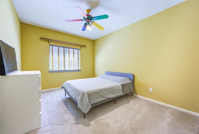 23742 Indian Hills Way, Katy, TX 77494 - carpeted bedroom with baseboards and a ceiling fan